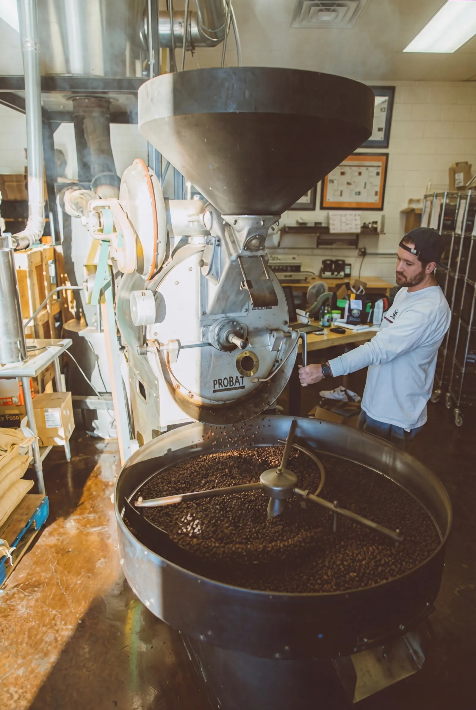 Coffee beans being roasted on a Probat roaster at Eiland Coffee Roasters in Richardson, TX